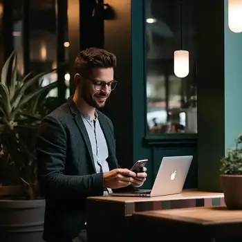 A man changing his IP address on a laptop