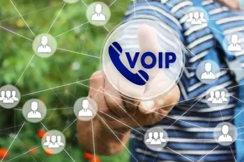 A man choosing Voice over Internet Protocol (VoIP)